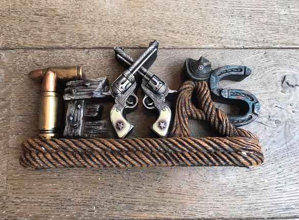 Beeldje pistolen Texas