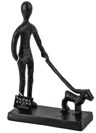 Beeld man met hond zwart